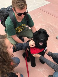 CSU students petting Timber